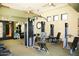 Gym with a variety of weight machines, mirrors, and ample workout space at 15802 N 71St St # 501, Scottsdale, AZ 85254