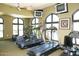 Gym with treadmills, elliptical machine, and mounted televisions at 15802 N 71St St # 501, Scottsdale, AZ 85254