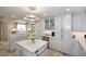 Bright kitchen featuring stone countertops, stainless steel appliances, and tile backsplash at 15802 N 71St St # 501, Scottsdale, AZ 85254