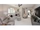 Comfortable living room showcasing neutral tones, stylish furniture, and plantation shutters at 15802 N 71St St # 501, Scottsdale, AZ 85254