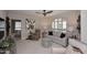 Comfortable living room showcasing neutral tones, stylish furniture, and plantation shutters at 15802 N 71St St # 501, Scottsdale, AZ 85254