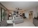 Spacious main bedroom with stylish decor, ceiling fan, and large windows offering lots of natural light at 15802 N 71St St # 501, Scottsdale, AZ 85254