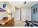 A bright bedroom with closet space, natural light, and a nice carpeted floor at 1708 W Seagull Ct, Chandler, AZ 85286