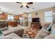 Open concept living room and kitchen with modern finishes and a neutral color palette at 1708 W Seagull Ct, Chandler, AZ 85286