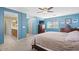 Serene main bedroom providing carpet floors, a ceiling fan, and an en-suite bathroom at 1708 W Seagull Ct, Chandler, AZ 85286
