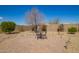 Backyard patio with brick pavers and outdoor seating, perfect for relaxing at 18118 W Redwood Ln, Goodyear, AZ 85338