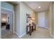 A hallway with a view to a living room and a bedroom at 19 N Agua Fria Ln, Casa Grande, AZ 85194