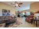 Expansive living room seamlessly connects with the dining area and kitchen, perfect for entertaining and Gathering gatherings at 19 N Agua Fria Ln, Casa Grande, AZ 85194