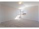 Bedroom with carpet flooring, natural light, and mountain views at 19437 N 43Rd Dr, Glendale, AZ 85308
