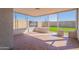 Enclosed patio with tile floor, walls, and a view of the backyard at 19437 N 43Rd Dr, Glendale, AZ 85308