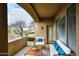 Relaxing covered patio with comfortable seating, perfect for enjoying outdoor living with beautiful views at 19475 N Grayhawk Dr # 1018, Scottsdale, AZ 85255