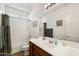 Bathroom with a single sink vanity and shower-tub combo at 21244 E Creekside Dr, Queen Creek, AZ 85142