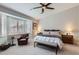 Cozy bedroom with a sitting area and natural light from bay window at 22181 N 78Th St, Scottsdale, AZ 85255