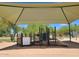 Outdoor community playground with shaded canopy, slide and climbing features for hours of fun at 22181 N 78Th St, Scottsdale, AZ 85255