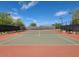 Community tennis court is ready for a match with lighting for evening play at 22181 N 78Th St, Scottsdale, AZ 85255