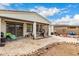 Lovely backyard patio area with stone landscaping and view of the neighbor's fence at 22452 E Calle De Flores --, Queen Creek, AZ 85142