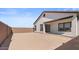 A spacious backyard is ready for landscaping and personal touches at 23435 W Albeniz Pl, Buckeye, AZ 85326
