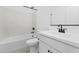 Clean bathroom featuring a bathtub and shower combination with modern black fixtures at 23435 W Albeniz Pl, Buckeye, AZ 85326