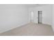 Bedroom with carpet, white walls, and a closet with sliding doors at 23435 W Albeniz Pl, Buckeye, AZ 85326