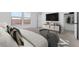 Comfortable bedroom with a view, TV, and a closet for ample storage at 23435 W Albeniz Pl, Buckeye, AZ 85326