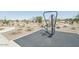 Outdoor exercise station with desert landscaping and easy access to walking paths for residents to enjoy at 24080 W Bowker St, Buckeye, AZ 85326