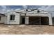 Under construction, this single-story home will feature a charming facade with a two-car garage at 24080 W Bowker St, Buckeye, AZ 85326