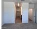 Main bedroom with walk-in closet and attached bathroom at 24088 W Bowker St, Buckeye, AZ 85326