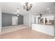 Open living room with easy access to the kitchen and ample space at 24824 W Pueblo Ave, Buckeye, AZ 85326