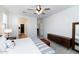 Spacious bedroom with a ceiling fan and modern furnishings at 266 N Piedra Way, Mesa, AZ 85207