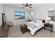 Well-lit bedroom with a comfortable bed and neutral decor at 266 N Piedra Way, Mesa, AZ 85207