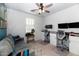 Home office area with desks, seating, and great natural light at 266 N Piedra Way, Mesa, AZ 85207