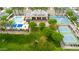 Aerial shot showcasing community amenities: a pool, basketball court, and tennis courts at 2708 S Santa Rita --, Mesa, AZ 85209