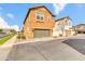 Charming two-story home with a green two-car garage and manicured landscaping at 2708 S Santa Rita --, Mesa, AZ 85209