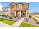 A charming home boasts a manicured lawn and inviting facade with well-kept landscaping at 2708 S Santa Rita --, Mesa, AZ 85209