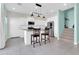 Modern kitchen with white cabinets, granite countertops, and stainless steel appliances at 2708 S Santa Rita --, Mesa, AZ 85209