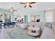 Open-concept living area with tile floors, modern furniture, and bright lighting at 2708 S Santa Rita --, Mesa, AZ 85209