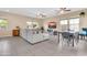 Bright living area with neutral decor, ample seating, and an adjacent dining space at 2708 S Santa Rita --, Mesa, AZ 85209