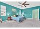 Bright main bedroom featuring a ceiling fan, plush carpet, and neutral décor at 2708 S Santa Rita --, Mesa, AZ 85209