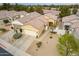 Overhead shot of a desert home showcasing a two-car garage and low-maintenance landscape at 3252 E Fremont Rd, Phoenix, AZ 85042