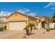 Charming single-story home with a two-car garage, desert landscaping and a well maintained front yard at 3252 E Fremont Rd, Phoenix, AZ 85042