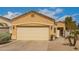 Charming single-story home with a two-car garage and well maintained front yard at 3252 E Fremont Rd, Phoenix, AZ 85042