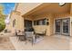 Enjoy this patio with comfortable seating and a grill, ideal for relaxing and entertaining in the outdoors at 3252 E Fremont Rd, Phoenix, AZ 85042