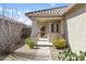 Welcoming front porch with desert landscaping, offering a charming entrance to the home at 3407 W Steinbeck Dr, Anthem, AZ 85086