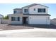 Charming two-story home featuring a neutral color palette, inviting entrance, and well-manicured front yard at 40101 N Alameda Dr, San Tan Valley, AZ 85140