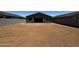 Spacious backyard with a blank canvas, ready for landscaping and outdoor enjoyment at 4329 E Brook Lynn Pl, San Tan Valley, AZ 85143