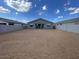 Expansive backyard featuring dirt landscaping and a privacy fence, perfect for creating your outdoor oasis at 4329 E Brook Lynn Pl, San Tan Valley, AZ 85143