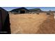 Large, flat backyard area awaiting landscaping and personalization at 4329 E Brook Lynn Pl, San Tan Valley, AZ 85143