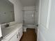 Clean bathroom with a modern vanity, toilet, and shower over tub combo at 4329 E Brook Lynn Pl, San Tan Valley, AZ 85143