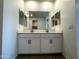 Modern bathroom features dual sinks, vanity, ample lighting, and sleek design at 4329 E Brook Lynn Pl, San Tan Valley, AZ 85143