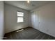 Bright bedroom features a window and closet with neutral walls and carpet at 4329 E Brook Lynn Pl, San Tan Valley, AZ 85143